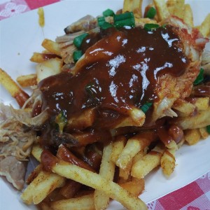 Loaded fries with Kimchi, Pulled Pork, Fatboy Sauce, & Cheese